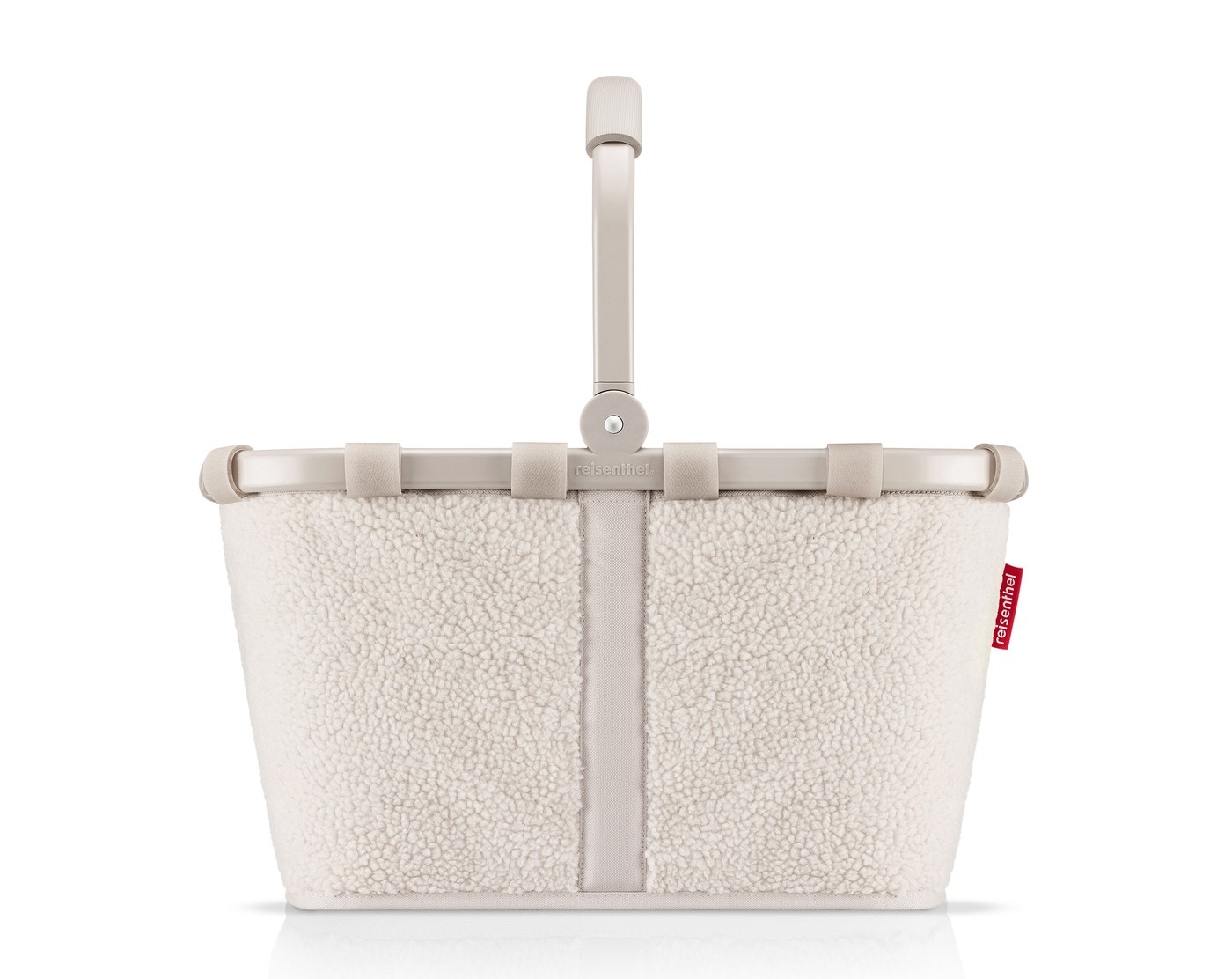 Sandfarbener Reisenthel Carrybag Korb mit weichem Teddyfell