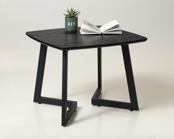 Schwarzer Actona Couchtisch mit Buch und Pflanze dekoriert