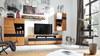 Interliving Anbauwand bei Möbel Turflon Interliving Anbauwand dunkles Holz und schwarze Highlights