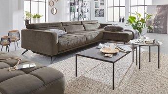 Interliving Wohnlandschaft dunkelgrün mit Recamiere und Hocker